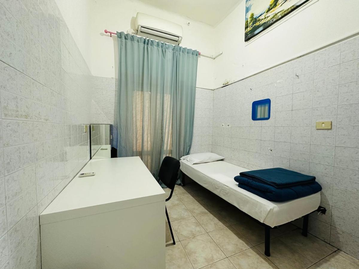 Camera Singola con Bagno in Comune