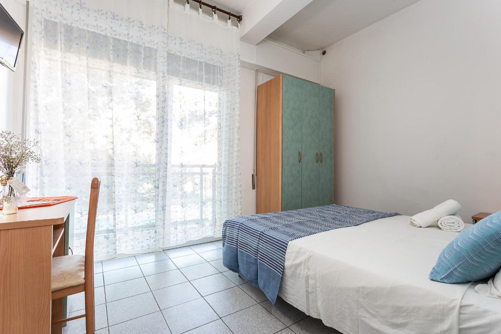 Camera Familiare con Balcone