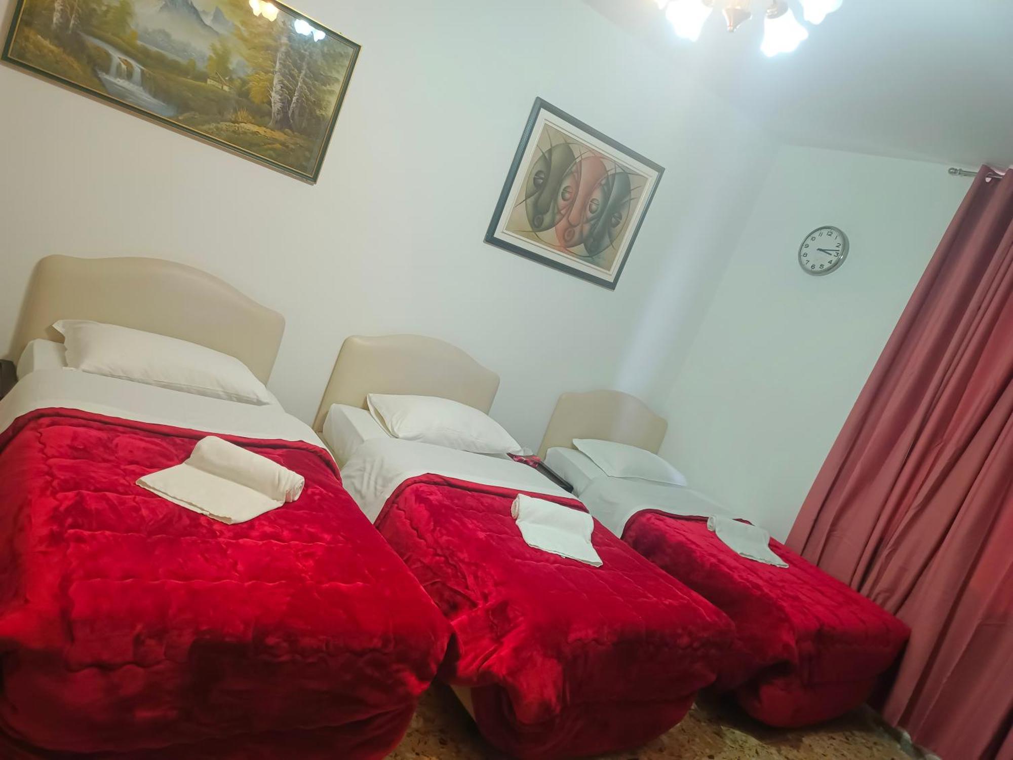 Camera Quadrupla con Bagno in Comune