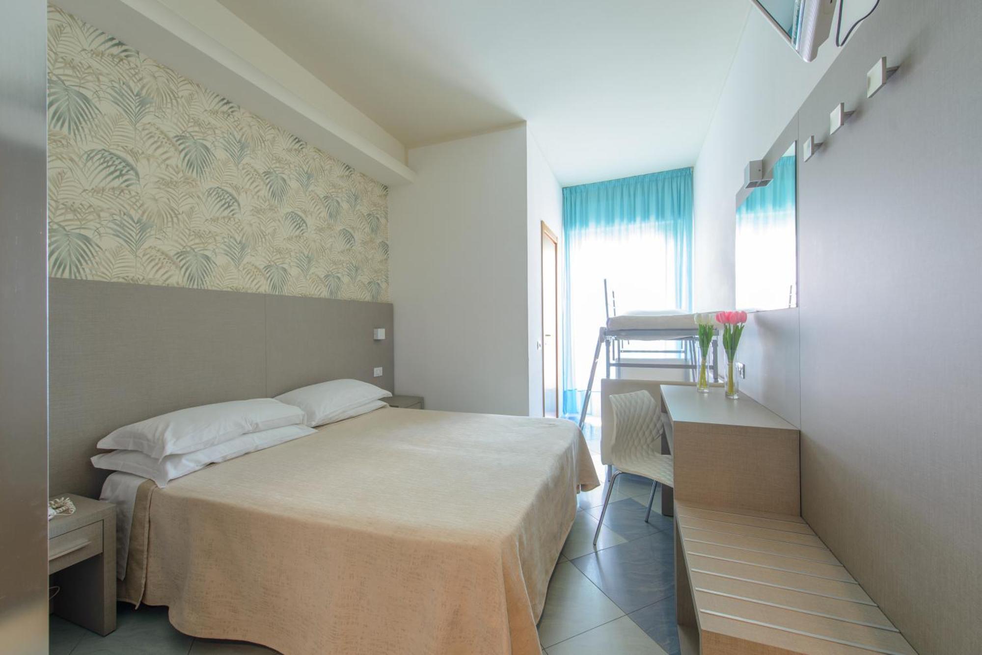 Quadruple Room with pacchetto spiaggia