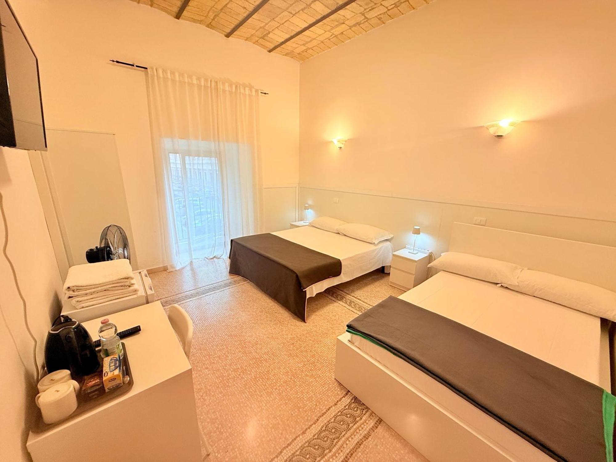 Camera Quadrupla Economy con Bagno in Comune