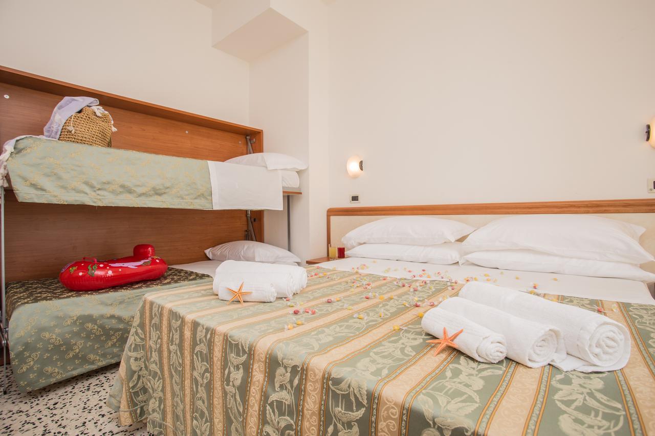 Triple Room (2 Adults + 1 Child) with Balcony,640673235:JPEG