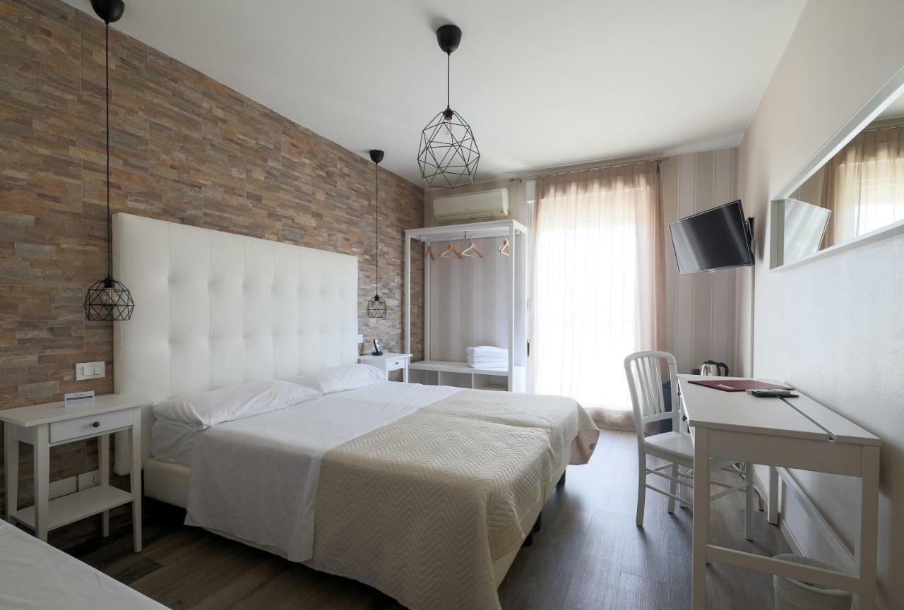 Camera Familiare (2 Adulti + 2 Bambini)